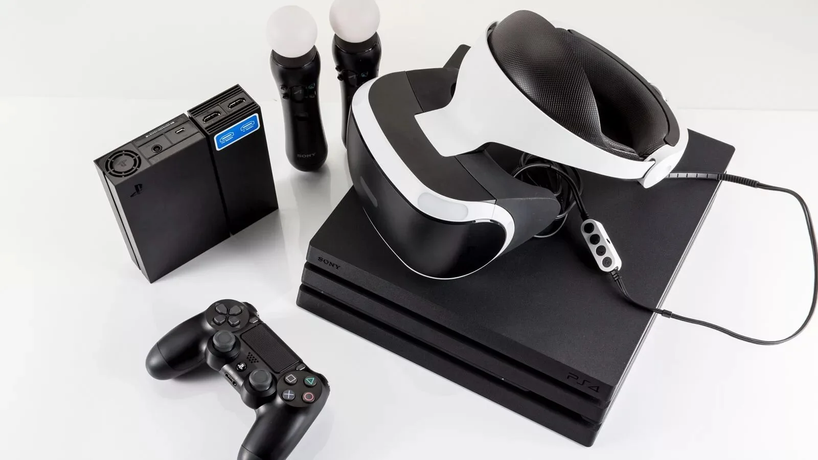 A complete VR set including headset, controllers, and game box.